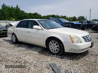 2009 Cadillac DTS 1SC z VIN 1G6KD57Y99U141826, wystawiony jako Copart lot #56242094 z przebiegiem 107 960 mil mil oraz Szkoda całkowita • Salvage title. Historia ofert i sprzedaży dostępna na DreamBid. Obrazek 4.