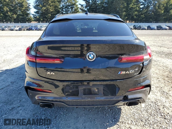 2021 BMW X4 M40i с VIN 5UX2V5C01M9F24036, выставлен на аукционе Copart как лот 74834364 с пробегом 38 185 миль миль и Списание • Salvage title. История ставок и продаж доступна на DreamBid. Изображение 6.