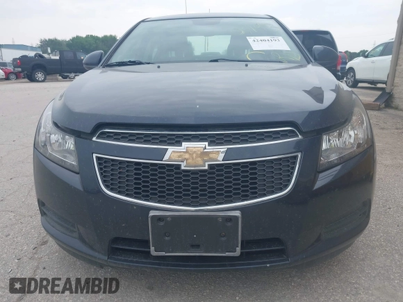 2014 Chevrolet Cruze 1LT z VIN 1G1PC5SB3E7242029, wystawiony jako IAAI lot #42404193 z przebiegiem 143 896 mil mil oraz . Historia ofert i sprzedaży dostępna na DreamBid. Obrazek 6.