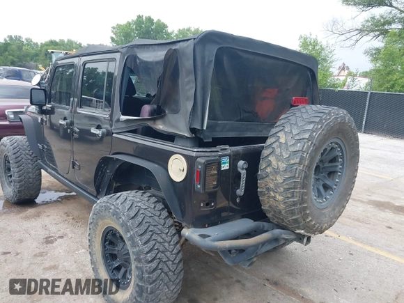 2013 Jeep Wrangler Unlimited Rubicon with VIN 1C4BJWFG5DL652050, listed as a IAAI auction lot 42451954 with 107,110 mi miles and . Bid and sale history available at DreamBid. Image 6.