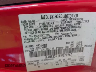 2008 Ford Focus SE with VIN 1FAHP35N18W272267, listed as a IAAI auction lot 41003854 with 239,062 mi miles. Bid and sale history available at carsss.com. Image 9.