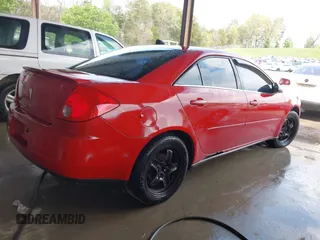 2007 Pontiac G6 with VIN 1G2ZG58B274108634, listed as a IAAI auction lot 42005168 with 239,053 mi miles. Bid and sale history available at carsss.com. Image 4.