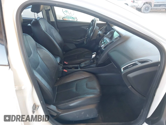 2015 Ford Focus Titanium with VIN 1FADP3J28FL256155, listed as a IAAI auction lot 42350610 with 53,840 mi miles and . Bid and sale history available at DreamBid. Image 5.