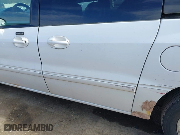 2006 Ford Freestar SEL z VIN 2FMZA52276BA05540, wystawiony jako IAAI lot #42001101 z przebiegiem Nie podano mil oraz . Historia ofert i sprzedaży dostępna na DreamBid. Obrazek 12.