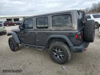 2019 Jeep Wrangler Unlimited Rubicon with VIN 1C4HJXFN0KW545613, listed as a Copart auction lot 42807785 with 64,510 mi miles and Salvage Title. Bid and sale history available at carsss.com. Image 2.
