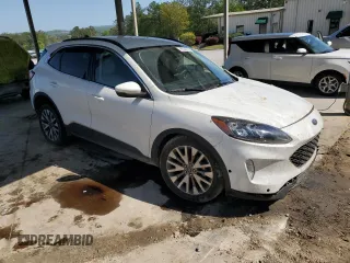 2020 Ford Escape Titanium с VIN 1FMCU9J93LUB38014, выставлен на аукционе Copart как лот 52348725 с пробегом 78 193 миль миль и Списание • Salvage title. История ставок и продаж доступна на DreamBid. Изображение 4.