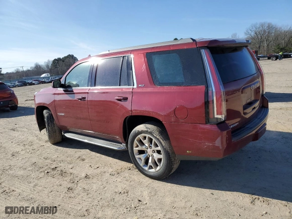 2016 GMC Yukon SLT with VIN 1GKS1BKC4GR346877, listed as a Copart auction lot 41366705 with 131,695 mi miles and Salvage Title. Bid and sale history available at carsss.com. Image 2.