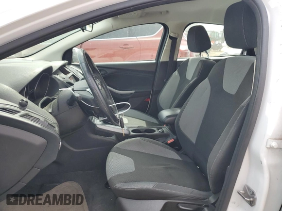2012 Ford Focus SE z VIN 1FAHP3K27CL256370, wystawiony jako Copart lot #42689255 z przebiegiem 92 641 mil mil oraz Szkoda całkowita • Salvage title. Historia ofert i sprzedaży dostępna na DreamBid. Obrazek 7.