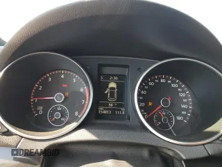 2012 Volkswagen GTI w/Conv & Sunroof z VIN WVWEV7AJ8CW148101, wystawiony jako Copart lot #74610214 z przebiegiem 154 813 mil mil oraz Szkoda całkowita • Salvage title. Historia ofert i sprzedaży dostępna na DreamBid. Obrazek 9.