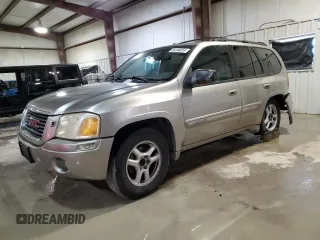 2002 GMC Envoy SLE with VIN 1GKDS13S622135607, listed as a Copart auction lot 84100254 with 298,811 mi miles and Salvage Title. Bid and sale history available at carsss.com. Image 1.