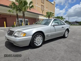 1996 Mercedes-Benz SL 320 with VIN WDBFA63F4TF138117, listed as a Copart auction lot 63440965 with 56,621 mi miles and Clean title. Bid and sale history available at DreamBid. Image 2.