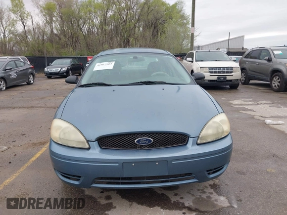 2005 Ford Taurus SE with VIN 1FAFP53U95A227003, listed as a IAAI auction lot 41927903 with 182,402 mi miles and . Bid and sale history available at DreamBid. Image 6.