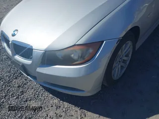 2007 BMW 3 Series 328i with VIN WBAVA33597PV64448, listed as a IAAI auction lot 41874952 with 203,284 mi miles. Bid and sale history available at carsss.com. Image 6.