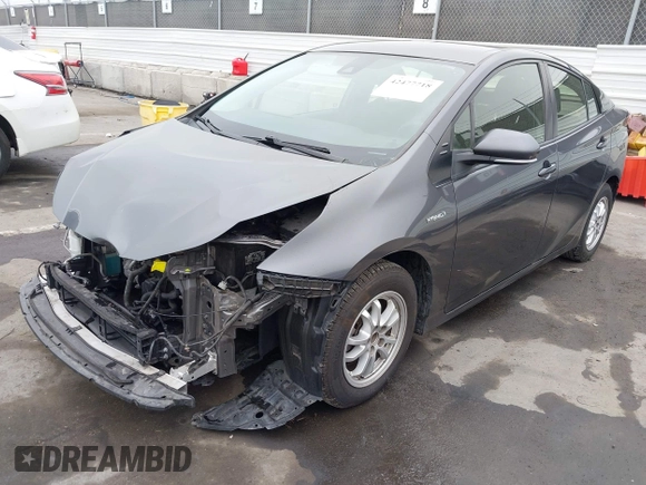 2021 Toyota Prius L Eco with VIN JTDKAMFU8M3144391, listed as a IAAI auction lot 42477718 with 314,346 mi miles and . Bid and sale history available at DreamBid. Image 18.