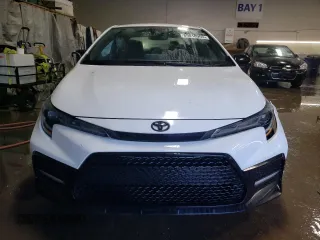 2022 Toyota Corolla SE with VIN 5YFS4MCE9NP122056, listed as a Copart auction lot 89010905 with 86,589 mi miles and Salvage Title. Bid and sale history available at carsss.com. Image 5.