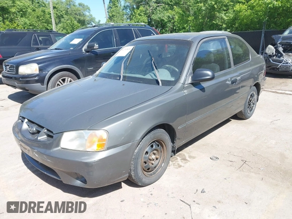 2001 Hyundai Accent GLS z VIN KMHCG35C01U136132, wystawiony jako IAAI lot #42293830 z przebiegiem 111 906 mil mil oraz . Historia ofert i sprzedaży dostępna na DreamBid. Obrazek 2.