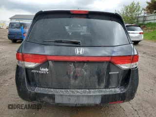 2014 Honda Odyssey Touring z VIN 5FNRL5H97EB508649, wystawiony jako Copart lot #55665245 z przebiegiem 162 892 mil mil oraz Czysty tytuł • Clean title. Historia ofert i sprzedaży dostępna na DreamBid. Obrazek 6.
