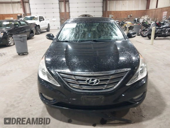 2012 Hyundai Sonata SE z VIN 5NPEC4AC9CH355351, wystawiony jako IAAI lot #42318588 z przebiegiem 122 864 mil mil oraz . Historia ofert i sprzedaży dostępna na DreamBid. Obrazek 12.