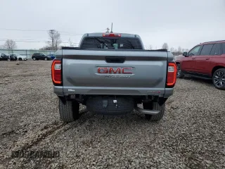 2023 GMC Canyon 4WD AT4 with VIN 1GTP6DEK5P1170230, listed as a Copart auction lot 52767295 with 26,769 mi miles and Salvage Title. Bid and sale history available at carsss.com. Image 6.