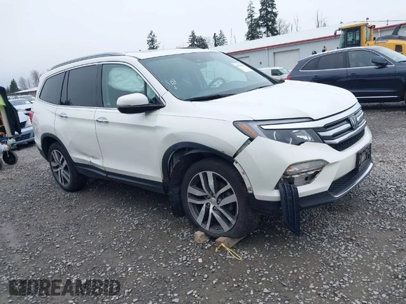 2017 Honda Pilot Elite with VIN 5FNYF6H06HB096156, listed as a IAAI auction lot 41771161 with 73,889 mi miles and . Bid and sale history available at DreamBid. Image 1.