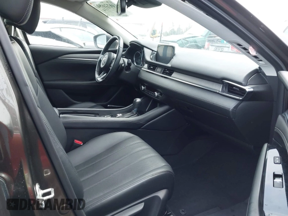 2018 Mazda 6 Grand Touring with VIN JM1GL1TYXJ1301545, listed as a IAAI auction lot 41131114 with 34,089 mi miles and . Bid and sale history available at DreamBid. Image 5.