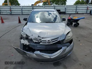 2005 Mazda 3 s with VIN JM1BK343051338251, listed as a Copart auction lot 54321465 with 106,183 mi miles and Salvage Title. Bid and sale history available at DreamBid. Image 5.