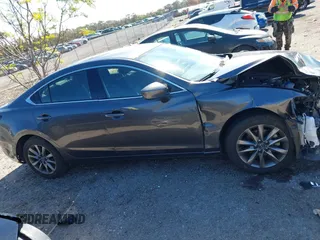 2020 Mazda 6 Sport with VIN JM1GL1UM7L1527203, listed as a IAAI auction lot 41378087 with 57,174 mi miles and . Bid and sale history available at DreamBid. Image 13.