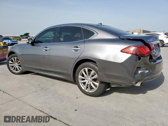 2015 Infiniti Q70 with VIN JN1BY1AR1FM561848, listed as a Copart auction lot 56432875 with 145,158 mi miles and Salvage title. Bid and sale history available at DreamBid. Image 2.