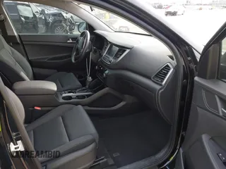 2018 Hyundai Tucson Sport with VIN KM8J33AL7JU772152, listed as a IAAI auction lot 41285203 with 87,188 mi miles. Bid and sale history available at carsss.com. Image 5.