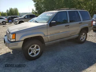 1998 Jeep Grand Cherokee Limited z VIN 1J4GZ88Z1WC231772, wystawiony jako Copart lot #55697775 z przebiegiem 178 896 mil mil oraz Czysty tytuł • Clean title. Historia ofert i sprzedaży dostępna na DreamBid. Obrazek 1.