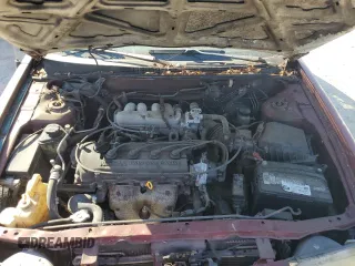 1996 Nissan Sentra XE z VIN 3N1AB41D3TL027288, wystawiony jako Copart lot #77255804 z przebiegiem 132 033 mil mil oraz Czysty tytuł • Clean title. Historia ofert i sprzedaży dostępna na DreamBid. Obrazek 11.