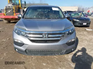2017 Honda Pilot EX-L with VIN 5FNYF6H50HB059096, listed as a IAAI auction lot 41757214 with 165,651 mi miles and . Bid and sale history available at DreamBid. Image 12.