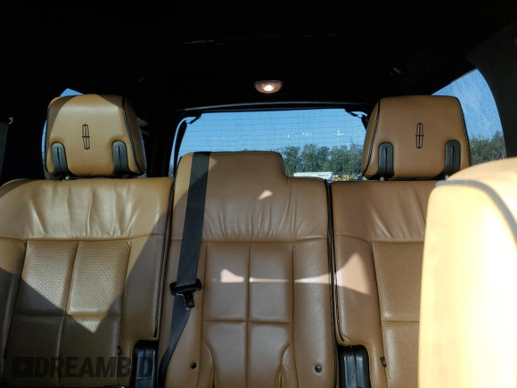 2011 Lincoln Navigator z VIN 5LMJJ2H52BEJ01696, wystawiony jako Copart lot #78605964 z przebiegiem 191 385 mil mil oraz Szkoda całkowita • Salvage title. Historia ofert i sprzedaży dostępna na DreamBid. Obrazek 10.