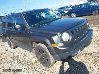 2014 Jeep Patriot Sport with VIN 1C4NJPBA0ED758437, listed as a IAAI auction lot 41532633 with 138,572 mi miles. Bid and sale history available at carsss.com. Image 1.