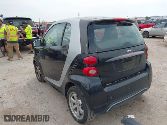 2013 Smart fortwo Pure with VIN WMEEJ3BA5DK620493, listed as a IAAI auction lot 42071086 with 85,883 mi miles and . Bid and sale history available at DreamBid. Image 3.