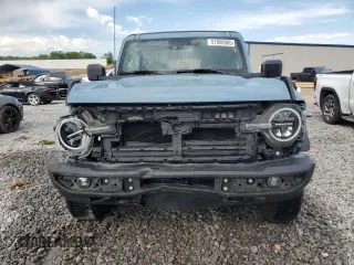 2021 Ford Bronco z VIN 1FMDE5BH0MLA96747, wystawiony jako Copart lot #57060985 z przebiegiem 37 048 mil mil oraz Szkoda całkowita • Salvage title. Historia ofert i sprzedaży dostępna na DreamBid. Obrazek 5.