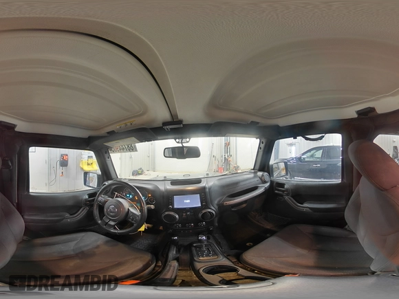 2017 Jeep Wrangler Willys Wheeler with VIN 1C4AJWAG9HL696710, listed as a Copart auction lot 88744905 with 66,800 mi miles and Salvage Title. Bid and sale history available at DreamBid. Image 15.