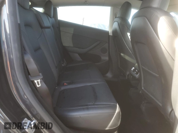 2024 Tesla Model Y with VIN 7SAYGDED7RF056973, listed as a Copart auction lot 87139214 with 15,391 mi miles and Salvage Title. Bid and sale history available at DreamBid. Image 10.