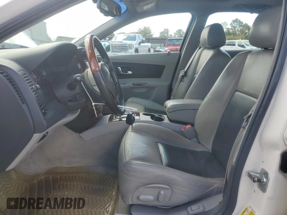 2006 Cadillac CTS with VIN 1G6DP577460126144, listed as a Copart auction lot 73348774 with 104,916 mi miles and Salvage Title. Bid and sale history available at carsss.com. Image 7.