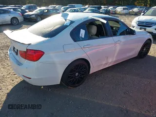 2014 BMW 3 Series 320i xDrive with VIN WBA3C3G51ENR25045, listed as a IAAI auction lot 40615577 with 150,046 mi miles. Bid and sale history available at carsss.com. Image 4.