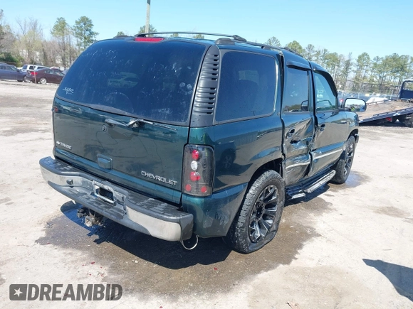 2004 Chevrolet Tahoe LS with VIN 1GNEK13Z74J182853, listed as a IAAI auction lot 41919117 with 141,188 mi miles. Bid and sale history available at carsss.com. Image 4.