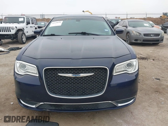 2015 Chrysler 300 Limited with VIN 2C3CCAAG5FH796498, listed as a IAAI auction lot 41520694 with 165,433 mi miles. Bid and sale history available at carsss.com. Image 12.