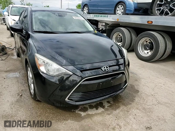 2016 Scion iA z VIN 3MYDLBZV3GY120380, wystawiony jako Copart lot #56506595 z przebiegiem 113 957 mil mil oraz Szkoda całkowita • Salvage title. Historia ofert i sprzedaży dostępna na DreamBid. Obrazek 13.