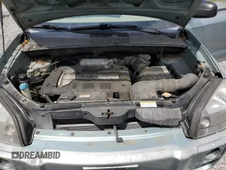 2005 Hyundai Tucson GL with VIN KM8JM12B05U148660, listed as a Copart auction lot 54302805 with 257,233 mi miles and Salvage title. Bid and sale history available at DreamBid. Image 12.