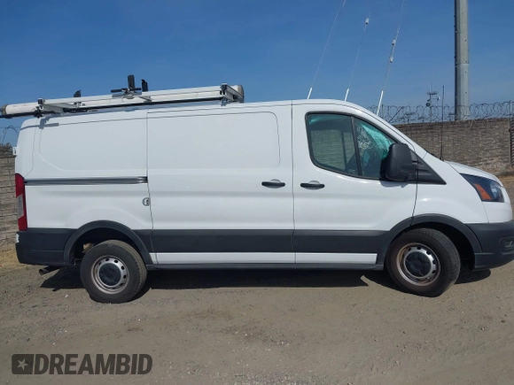 2023 Ford Transit Cargo z VIN 1FTYE1Y81PKB53926, wystawiony jako IAAI lot #42514906 z przebiegiem 52 410 mil mil oraz . Historia ofert i sprzedaży dostępna na DreamBid. Obrazek 13.