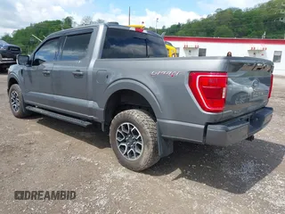 2021 Ford F-150 XL with VIN 1FTFW1E56MKE74015, listed as a IAAI auction lot 42172934 with 27,186 mi miles and . Bid and sale history available at DreamBid. Image 3.