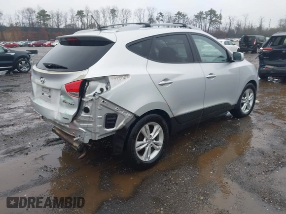 2011 Hyundai Tucson Limited with VIN KM8JUCAC9BU200367, listed as a IAAI auction lot 41867617 with 228,456 mi miles and . Bid and sale history available at DreamBid. Image 4.