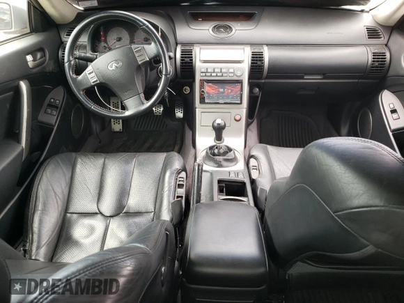 2003 Infiniti G35 w/Leather z VIN JNKCV54E93M209766, wystawiony jako Copart lot #58235305 z przebiegiem 187 660 mil mil oraz Tytuł czysty. Historia ofert i sprzedaży dostępna na DreamBid. Obrazek 8.