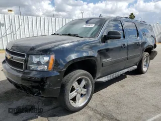 2013 Chevrolet Suburban LT with VIN 1GNSKJE76DR318499, listed as a Copart auction lot 71840624 with 191,050 mi miles and Salvage Title. Bid and sale history available at carsss.com. Image 1.