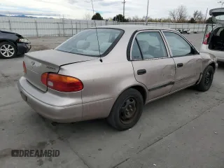 1998 Chevrolet Prizm with VIN 1Y1SK5488WZ412490, listed as a Copart auction lot 49676075 with 151,124 mi miles and Salvage title. Bid and sale history available at DreamBid. Image 3.
